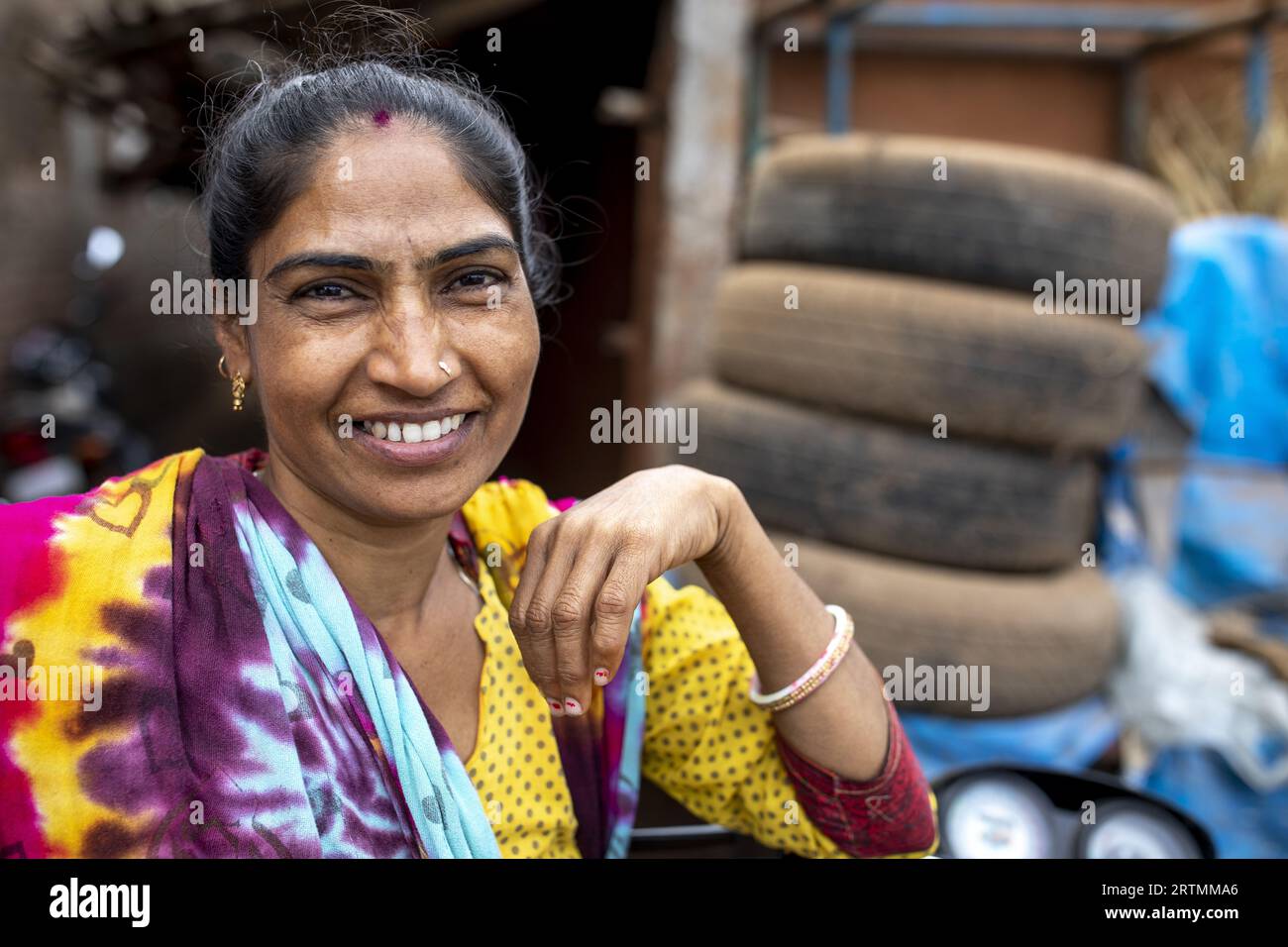 Smiling Adivasi woman in Dediapada, Gujarat, India Stock Photo