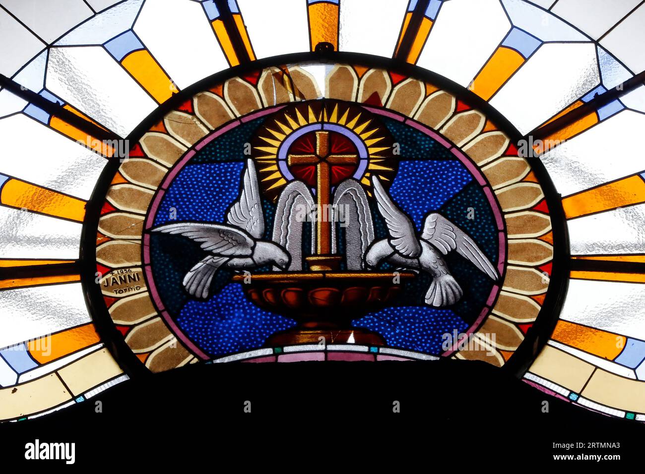 Saint-Grat church. Stained glass window. Two doves and christian cross ...