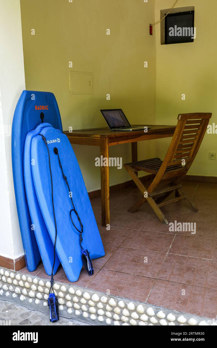 Surfing boards outside a hotel room in Ndayane, Senegal Stock Photo