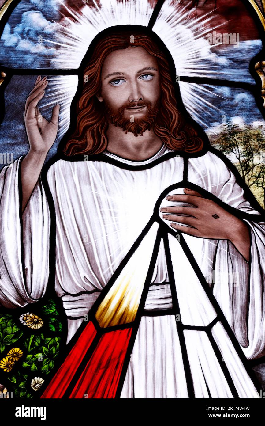 Song Vinh catholic church. Stained glass window. Merciful Jesus, I trust in you. The Divine