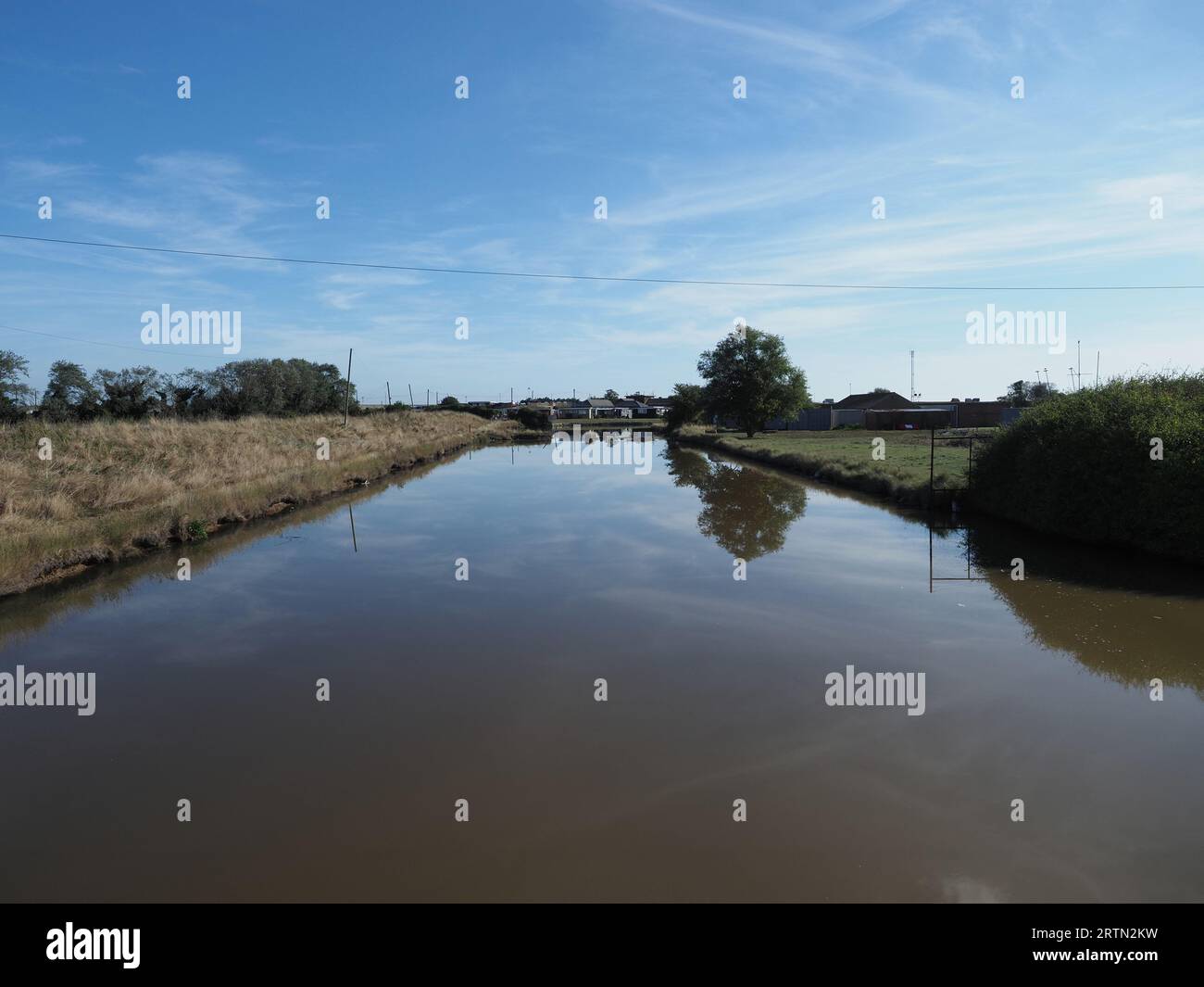 Sheerness, Kent, UK. 14th Sep, 2023. UK Weather: a sunny and calm morning in Sheerness, Kent. View along the Sheerness canal also known as the Queenborough Lines - Royal Commission fortified lines originally intended to protect Sheerness dockyard from land attack. Credit: James Bell/Alamy Live News Stock Photo