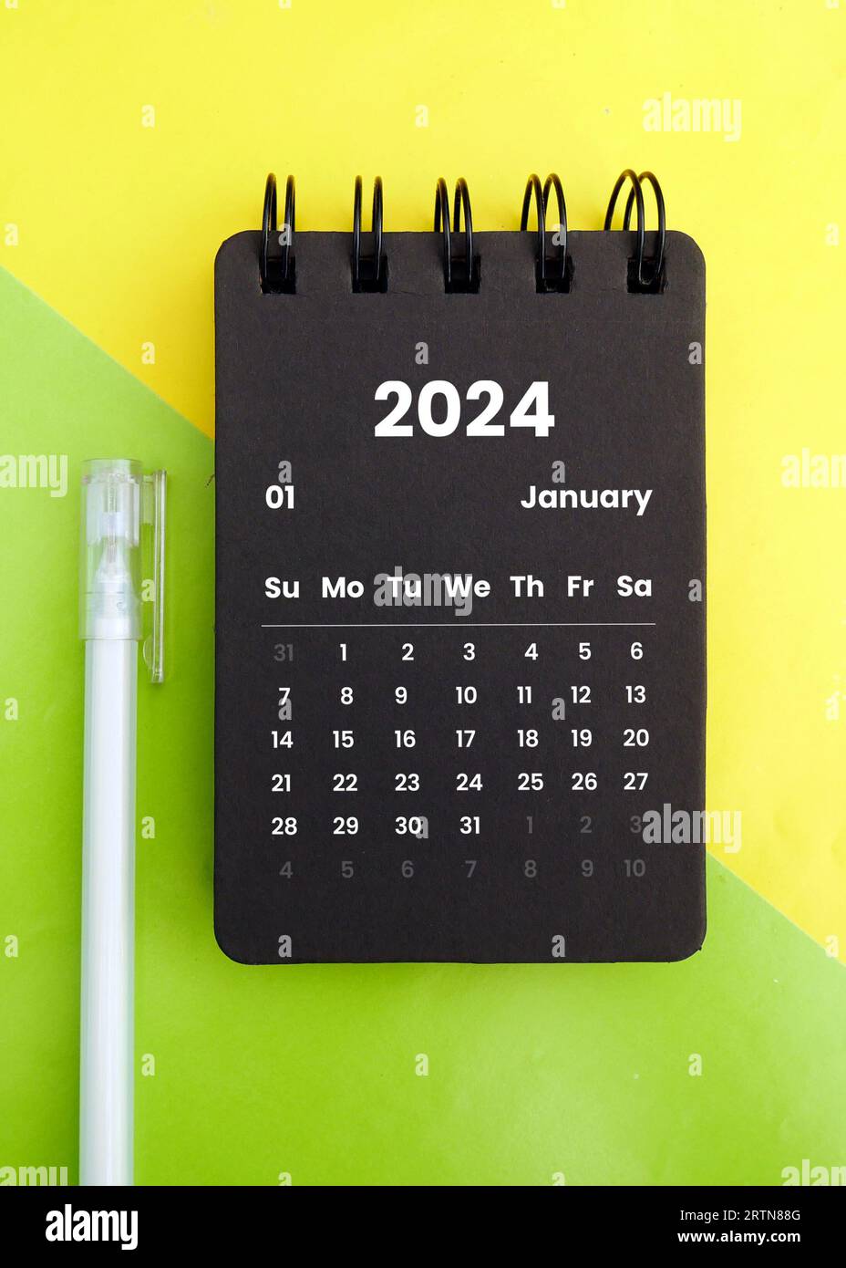 January 2024 Monthly black desk calendar for 2024 year on beautiful