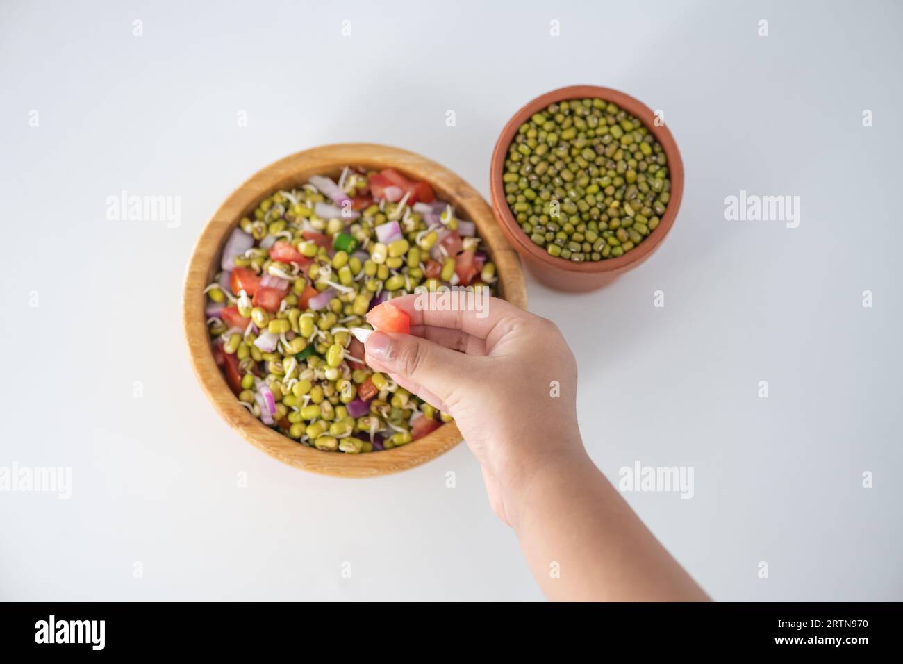 Sprouting green gram bean Indian salad with Onion, coriander leaf