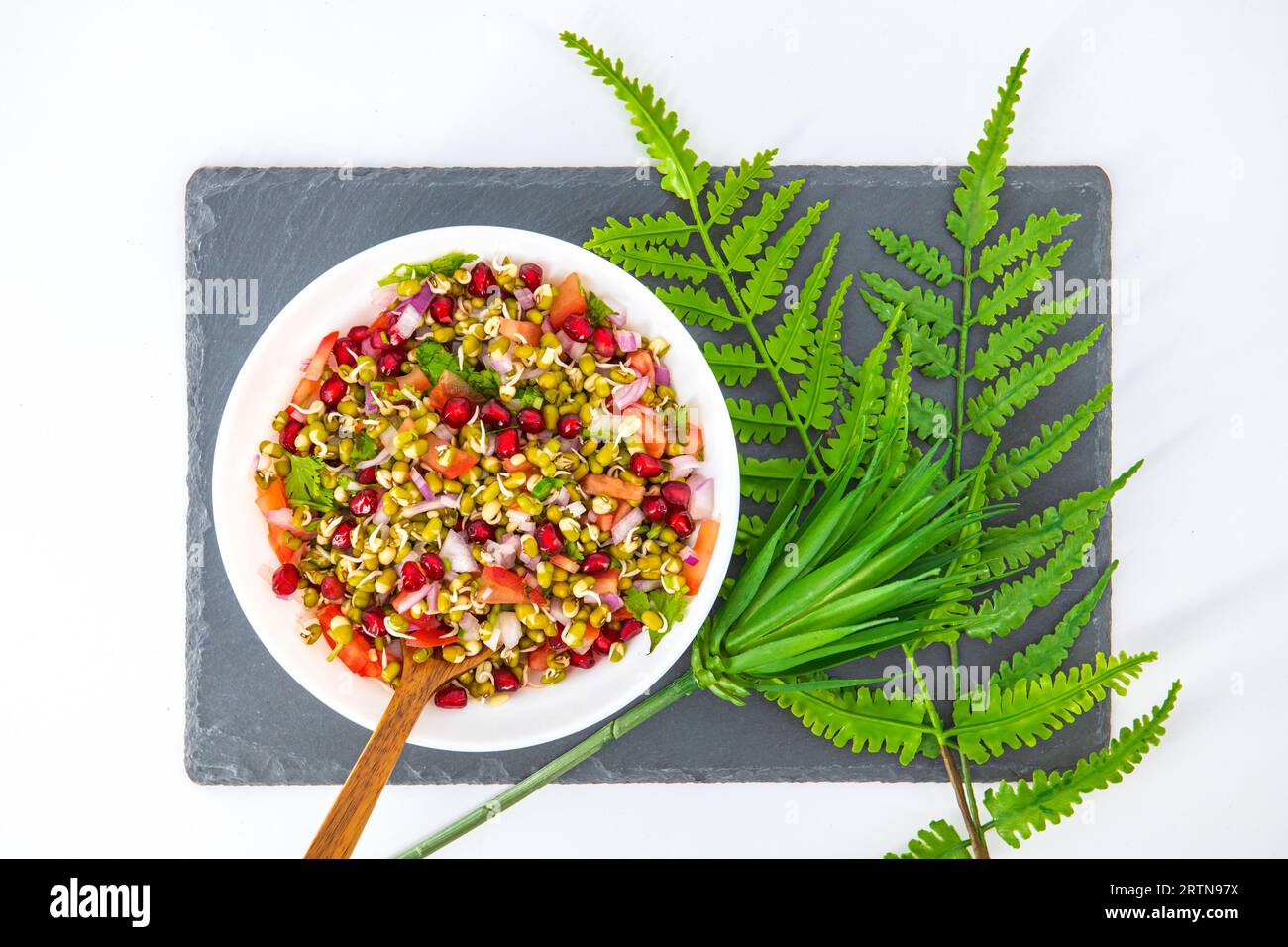 Sprouting green gram bean Indian salad with Onion, coriander leaf