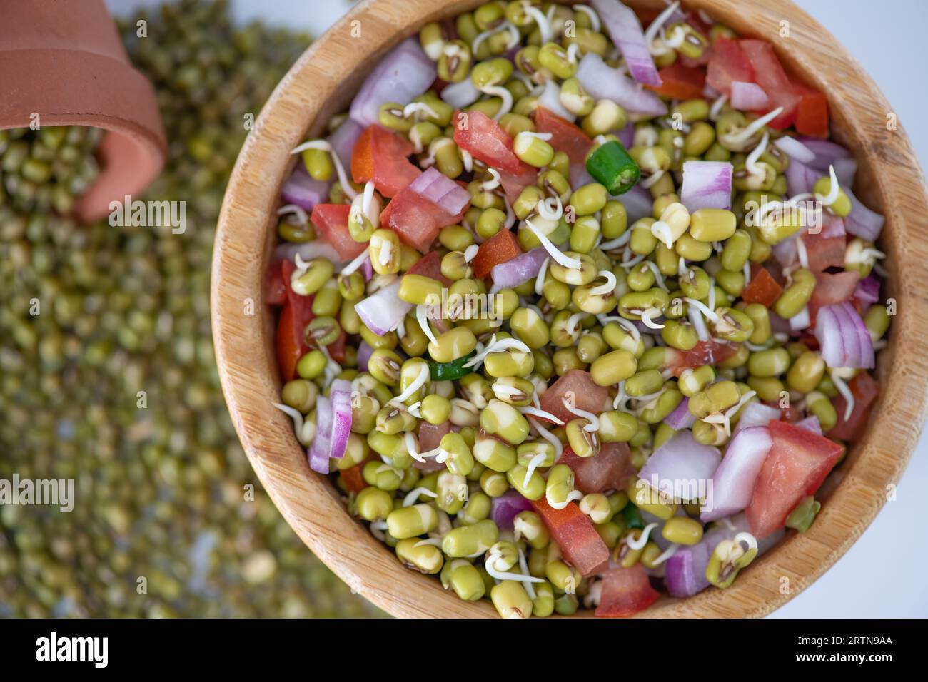 Sprouting green gram bean Indian salad with Onion, coriander leaf