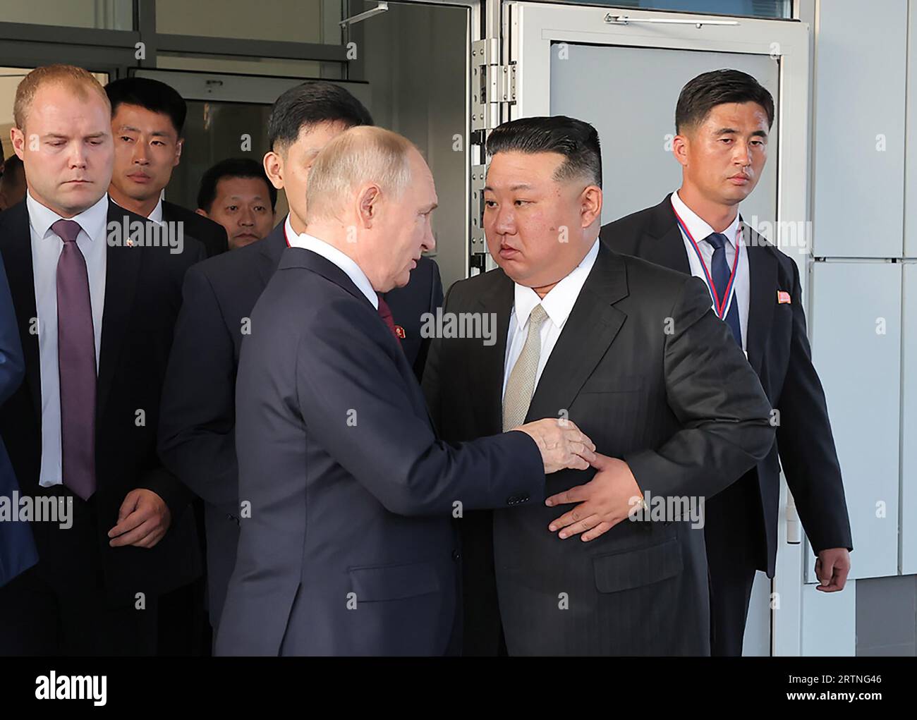 A photo provided by the North Korean government on september 14, shows that, North Korean leader Kim Jong Un (C-R), bids farewell to Russian President Vladimir Putin (C-L), as he departs from the Vostochny cosmodrome in Amur region, Russia on Wednesday, September 13, 2023. North Korean state news agency KCNA said on Thursday that, Russian President Vladimir Putin has accepted an invitation from North Korean leader Kim Jong Un to visit Pyongyang at Putin's 'convenient time'. The two leaders met in Russia's Far East on Wednesday for their first face-to-face summit in four years. During the summi Stock Photo