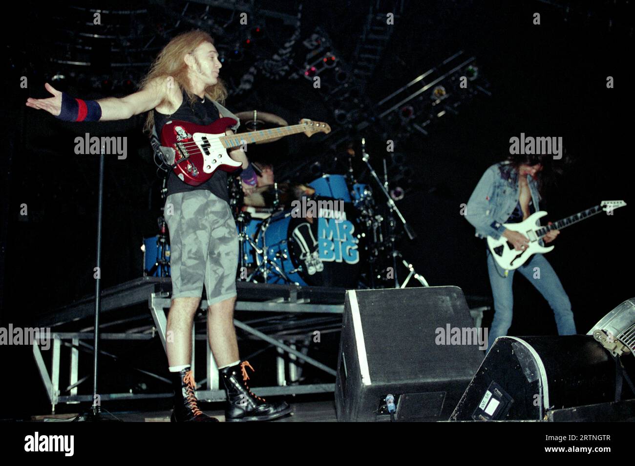 Milan Italy  1993-11-18:  Billy Sheehan bassist and Paul Gilbert guitarist of the Mr.Big group in concert at the Palatrussardi Stock Photo