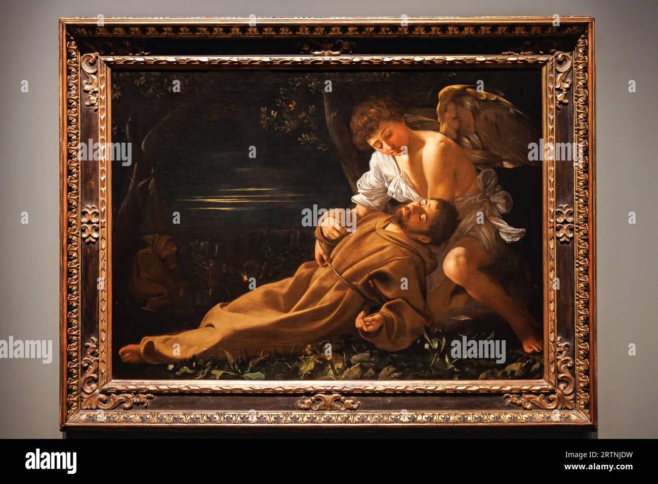 Painting Saint Francis of Assisi in Ecstasy showing an Angel comforting the Saint, by Michelangelo Merisi da Caravaggio, exposed at the National Galle Stock Photo