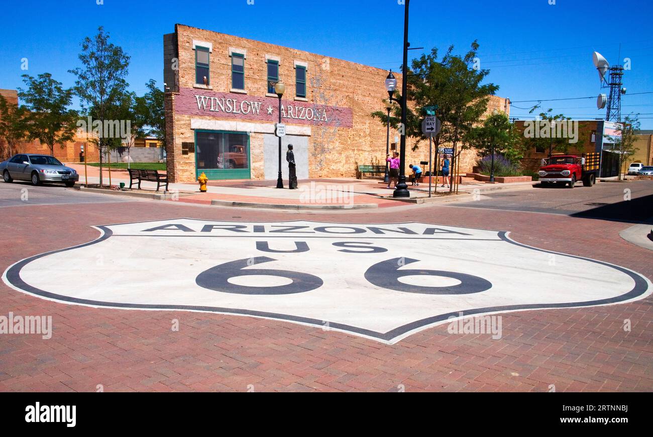 standin on the corner in winslow on route 66 arizona with a large
