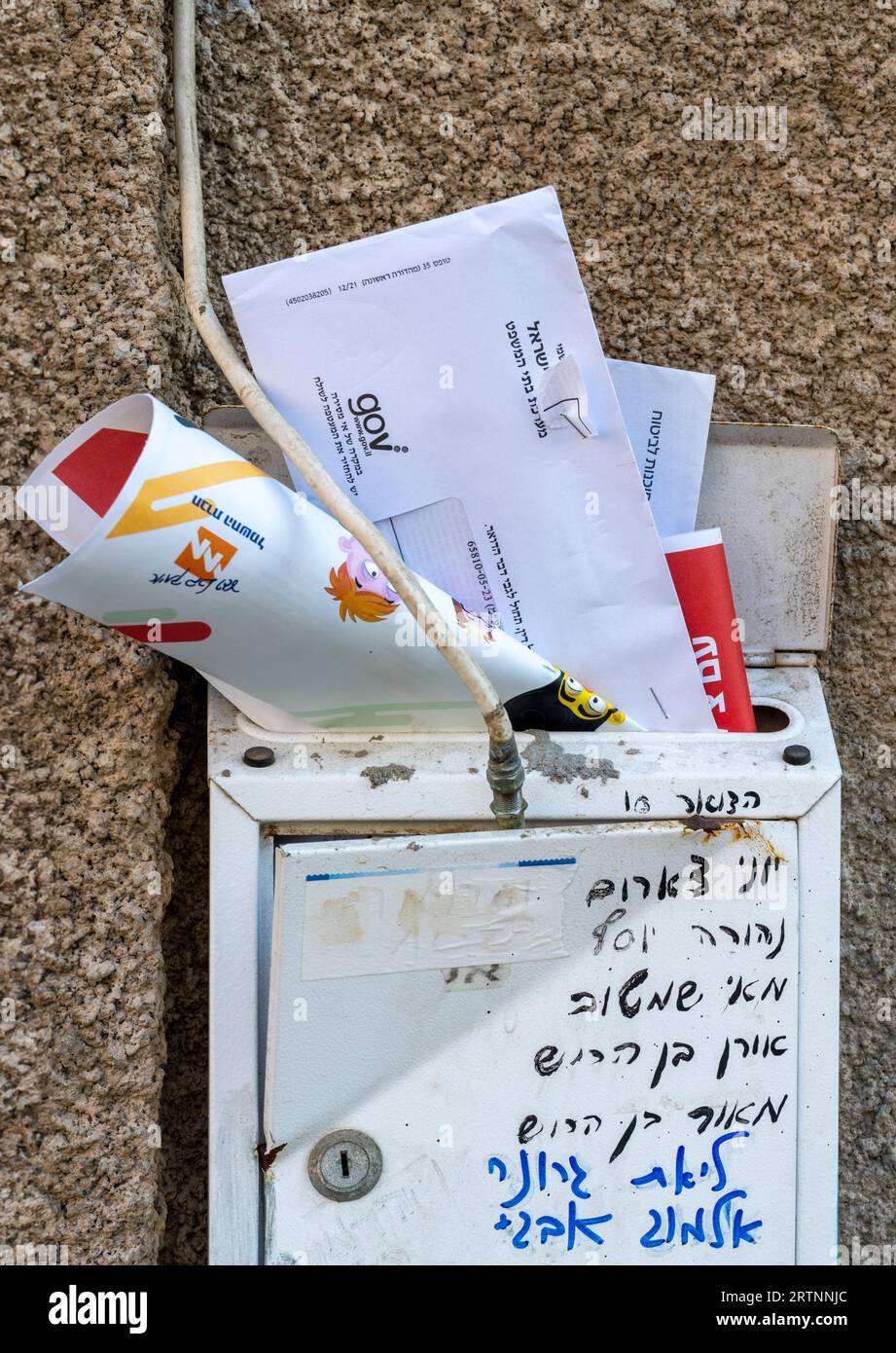 overflowing letter box Photographed in Jaffa, Israel Stock Photo