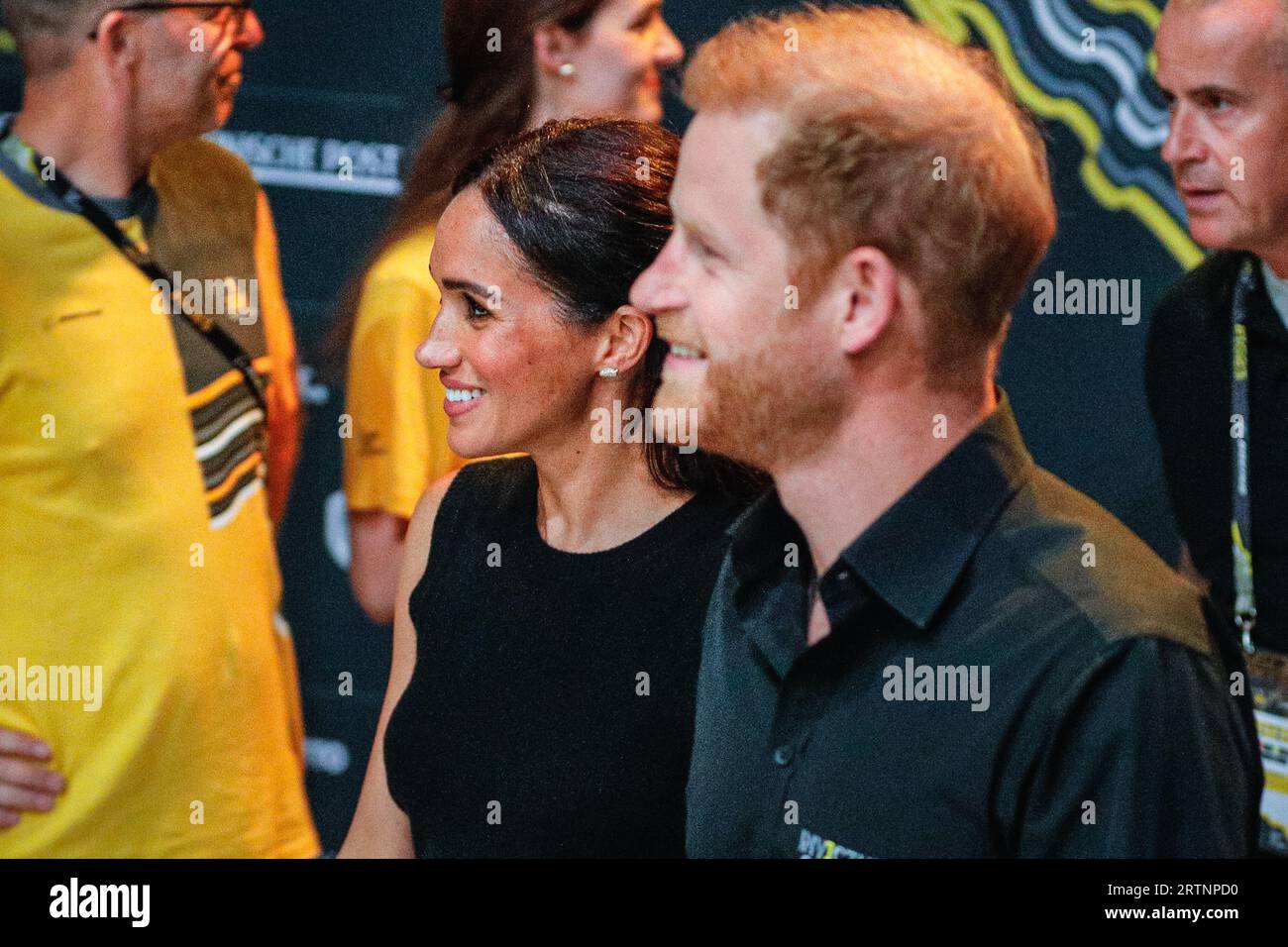 Düsseldorf, Germany. 13th Sep, 2023. Meghan, the Duchess of Sussex and Prince Harry, the Duke of Sussex are seen holding hands as they walk into the Merkur Spiel Arena for the wheelchair basket ball finals at the Invictus Games. Credit: Imageplotter/Alamy Live News Stock Photo