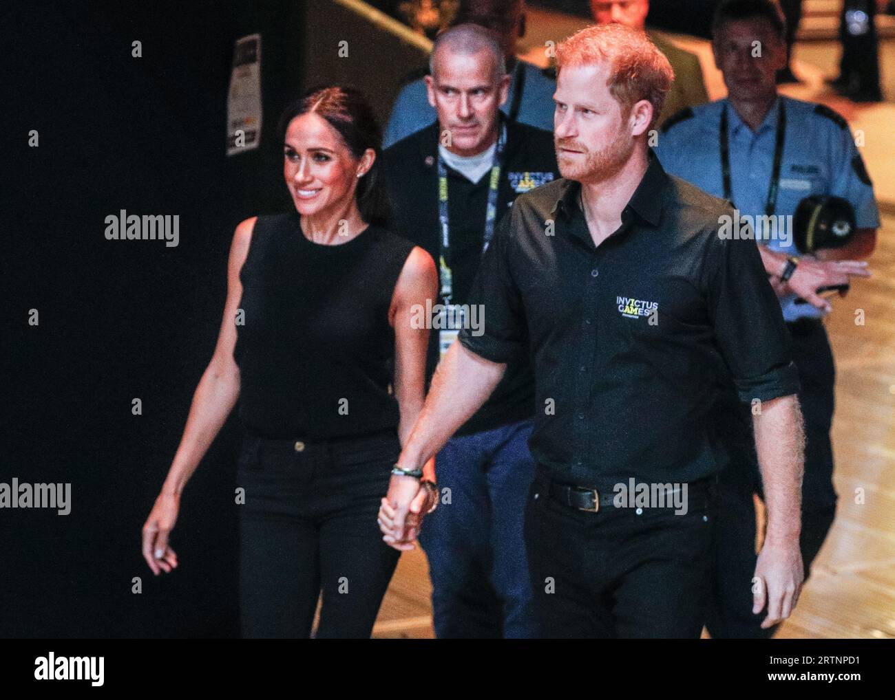 Düsseldorf, Germany. 13th Sep, 2023. Meghan, the Duchess of Sussex and Prince Harry, the Duke of Sussex are seen holding hands as they walk into the Merkur Spiel Arena for the wheelchair basket ball finals at the Invictus Games. Credit: Imageplotter/Alamy Live News Stock Photo