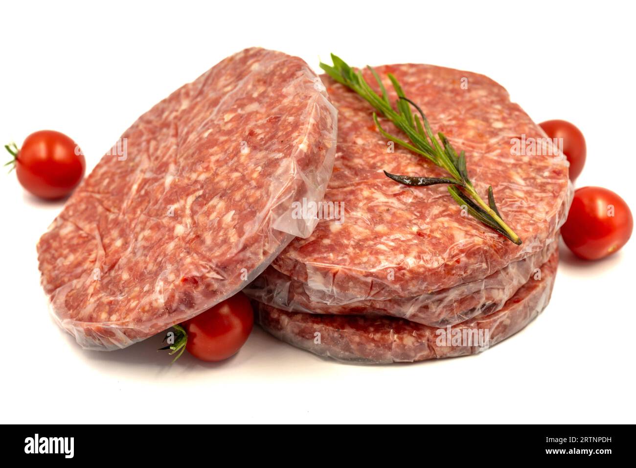 Raw hamburger patty isolated on white background. Raw veal hamburger