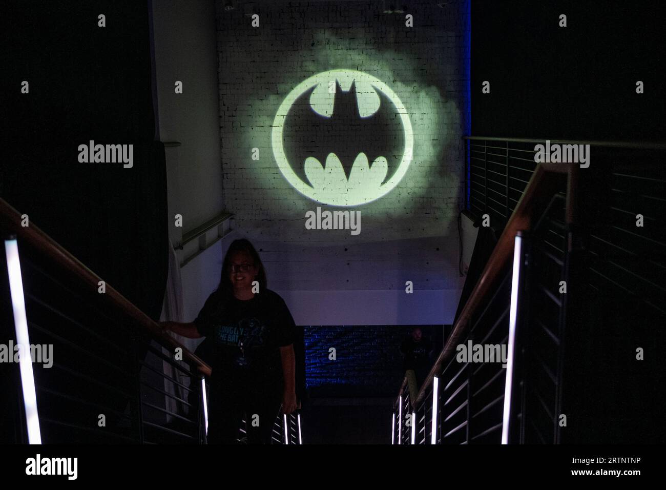 London, UK.  14 September 2023. The Bat Signal is recreated at the preview of Batman Unmasked at 180 Piccadilly.  Marking global Batman Day, The Caped Crusader’s legendary history is celebrated through rare comics from Batman’s beginnings, to his appearance in TV, movies, videogames and more.  The show is open to the public 15 to 17 September.  Credit: Stephen Chung / Alamy Live News Stock Photo