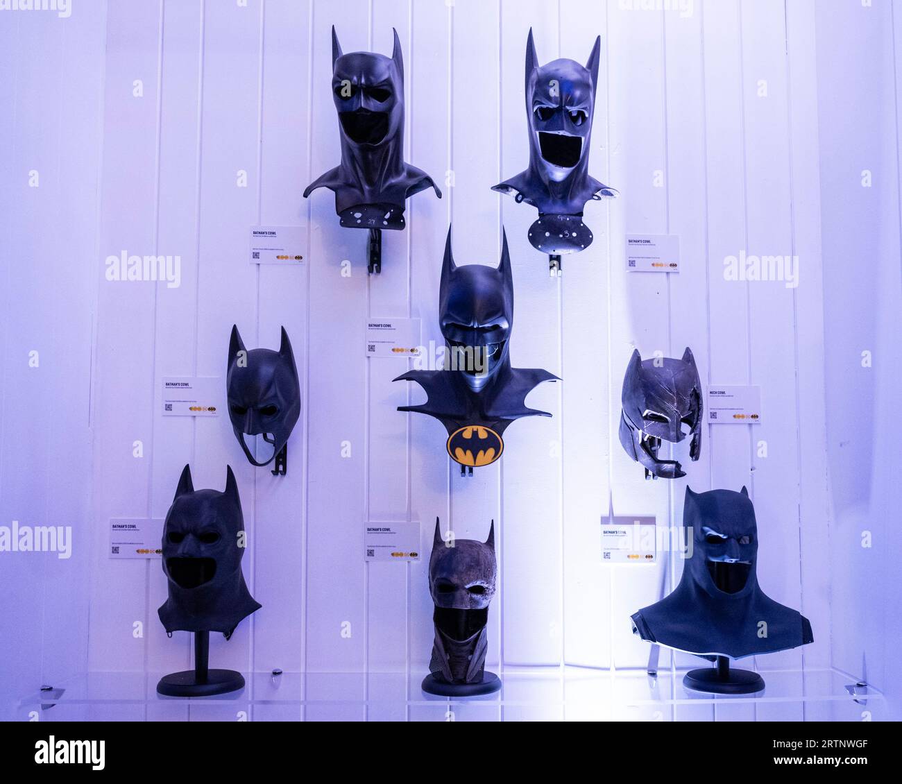 London, UK.  14 September 2023. Original Batcowls worn in different Batman movies at the preview of Batman Unmasked at 180 Piccadilly.  Marking global Batman Day, The Caped Crusader’s legendary history is celebrated through rare comics from Batman’s beginnings, to his appearance in TV, movies, videogames and more.  The show is open to the public 15 to 17 September.  Credit: Stephen Chung / Alamy Live News Stock Photo