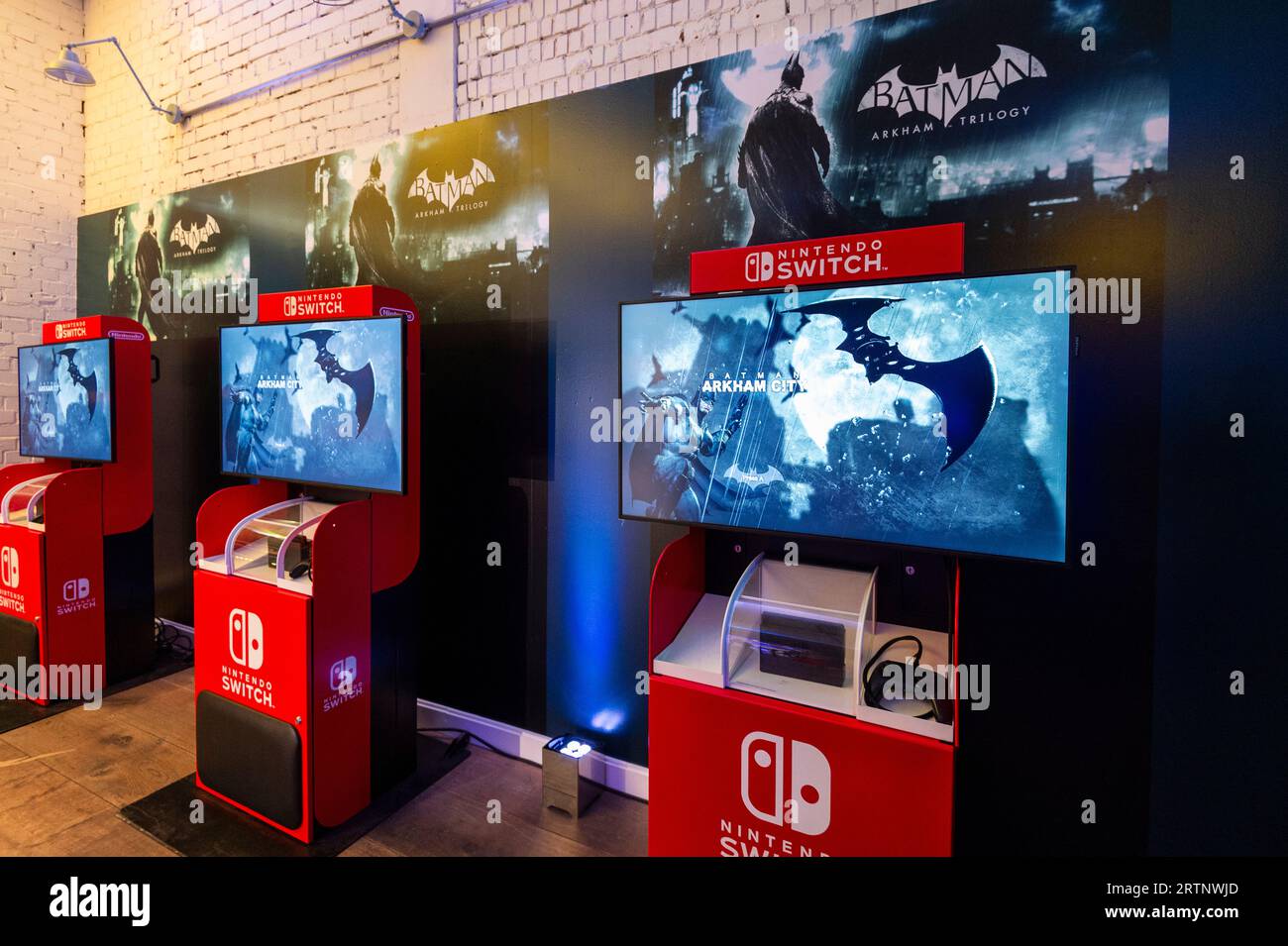 London, UK.  14 September 2023. Nintendo Switch Batman Arkham Trilogy console games at the preview of Batman Unmasked at 180 Piccadilly.  Marking global Batman Day, The Caped Crusader’s legendary history is celebrated through rare comics from Batman’s beginnings, to his appearance in TV, movies, videogames and more.  The show is open to the public 15 to 17 September.  Credit: Stephen Chung / Alamy Live News Stock Photo