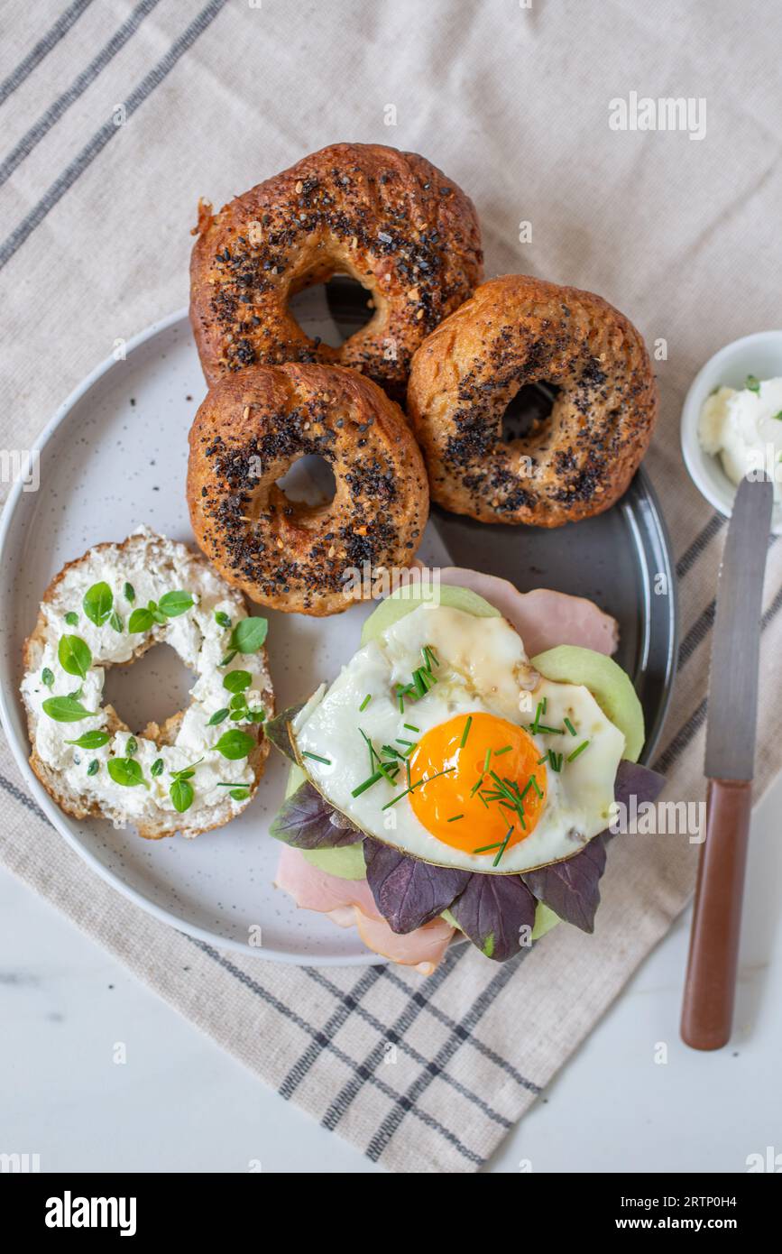 Everything bagels with cream cheese, turkey and cucumber Stock Photo