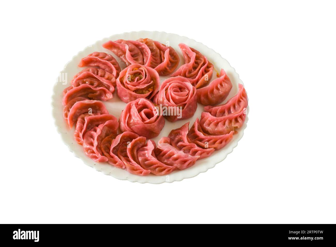 Momo is a popular Tibetan and Nepali dumpling, beloved for its exquisite taste and cultural significance. Stock Photo