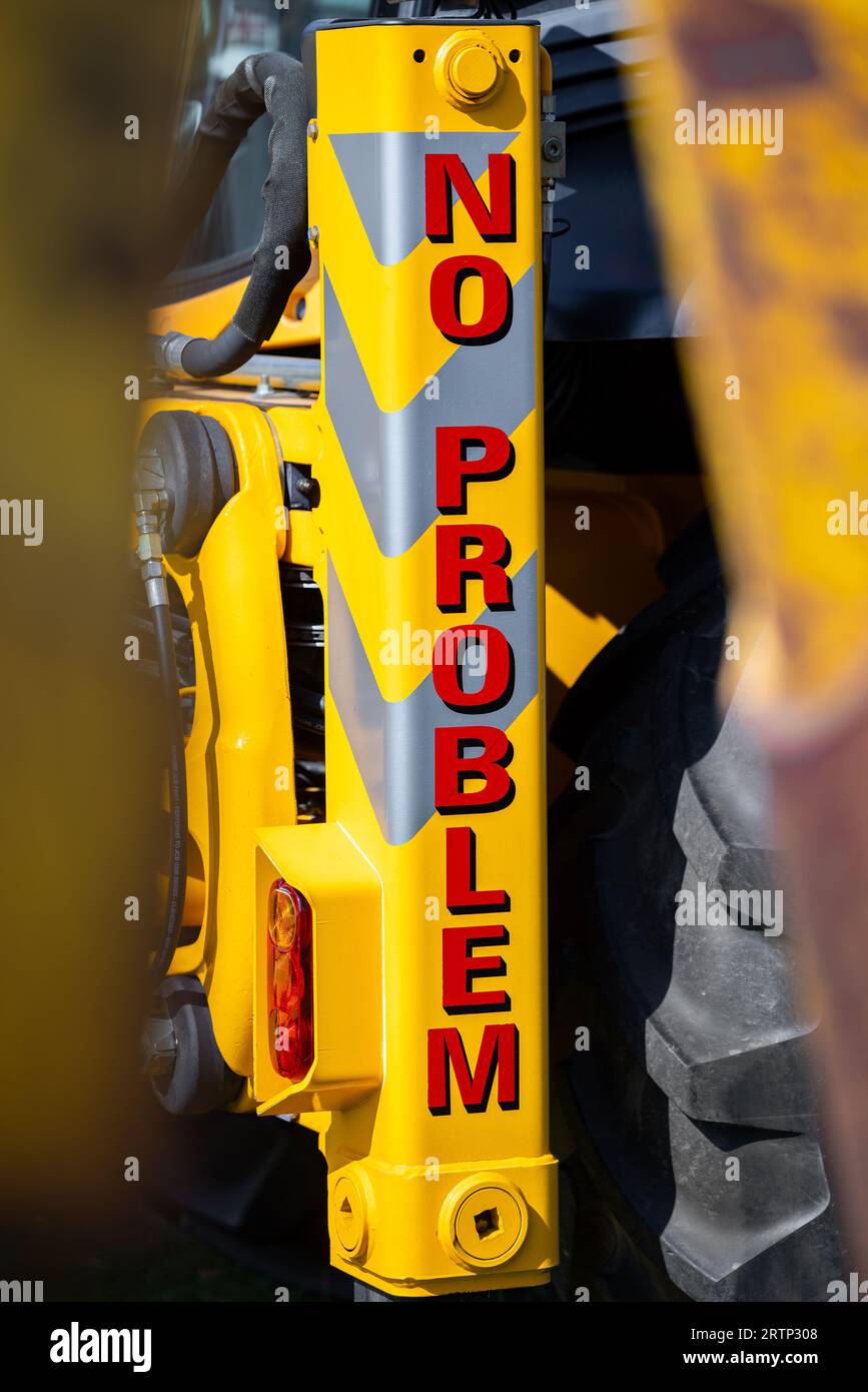 No problem writing text in red capital letters font with yellow background building machinery heavy duty. Stock Photo