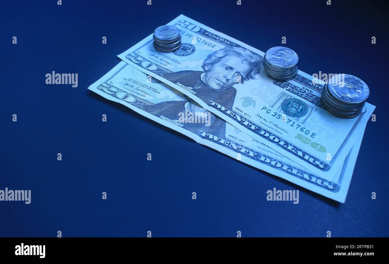 20 dollar bills with coins. Stock Photo