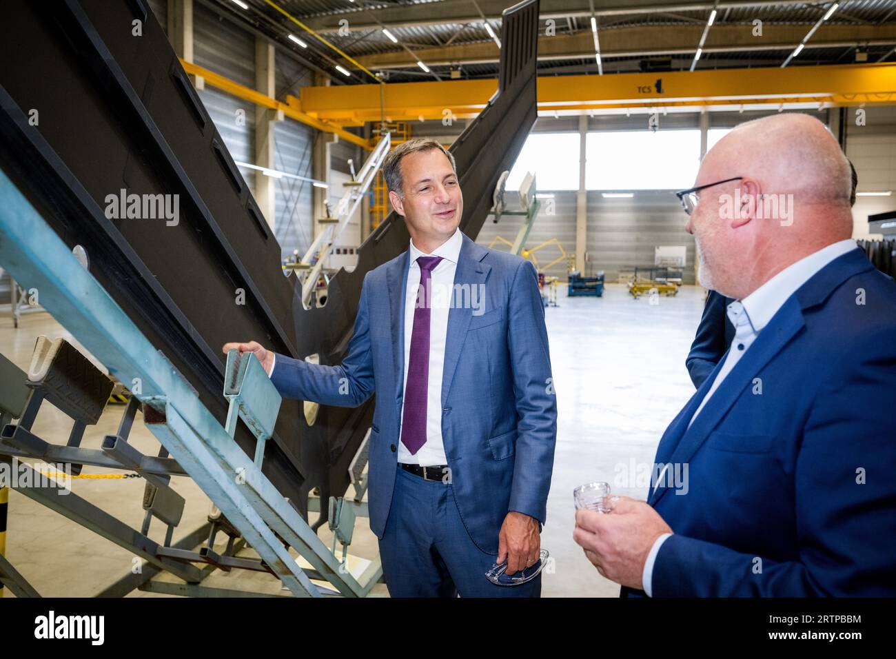 Lummen, Belgium. 14th Sep, 2023. Stephan De Koninck, general manager SABCA and Prime Minister Alexander De Croo pictured during a visit to the Sabca production facilities, in Lummen, Thursday 14 September 2023. At Sabca, innovative aero structures are produced in composite materials for applications in the defense and aviation industries. BELGA PHOTO JASPER JACOBS Credit: Belga News Agency/Alamy Live News Stock Photo