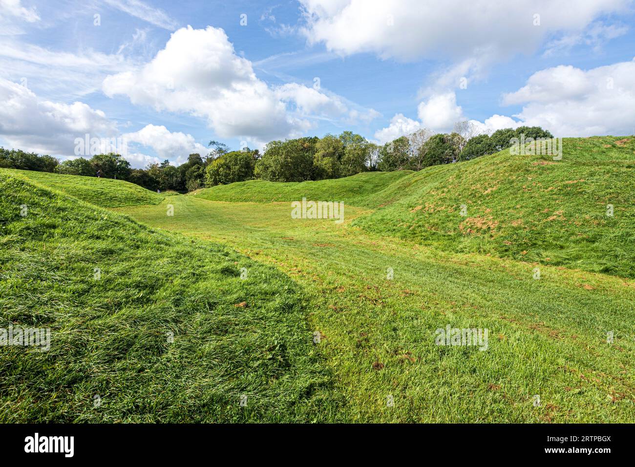 The early 2nd century AD Roman amphitheatre on the outskirts of Corinium, now the Cotswold town of Cirencester, Gloucestershire, England UK Stock Photo