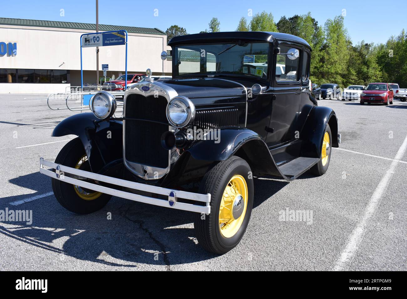 An Antique Ford Model A on display at a car show. Stock Photo