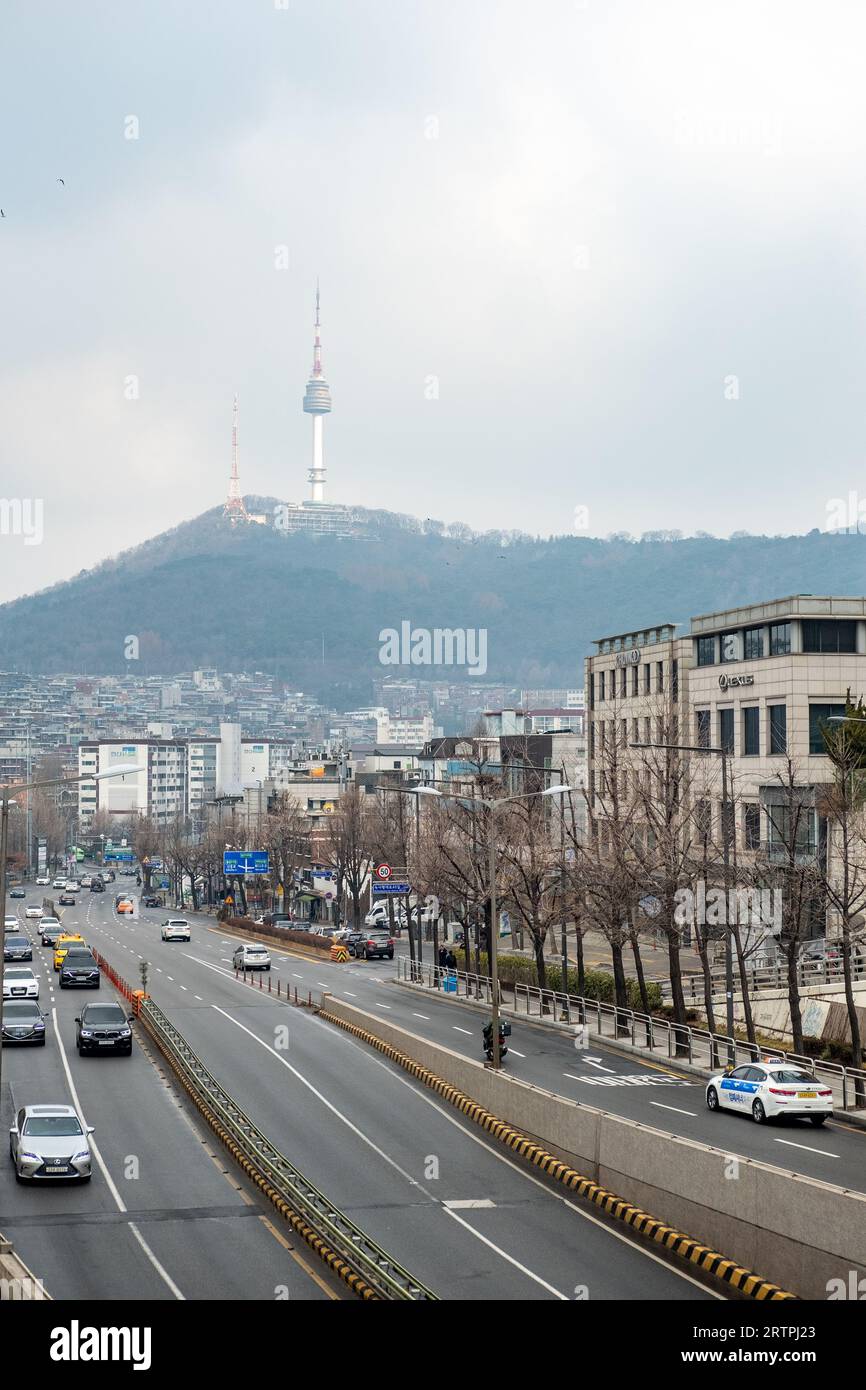 Seoul, South Korea - 19 February 2023: View of N Seoul Tower from Noksapyeong Bridge, one of the famous locations from Korean drama called Itaewon Cla Stock Photo