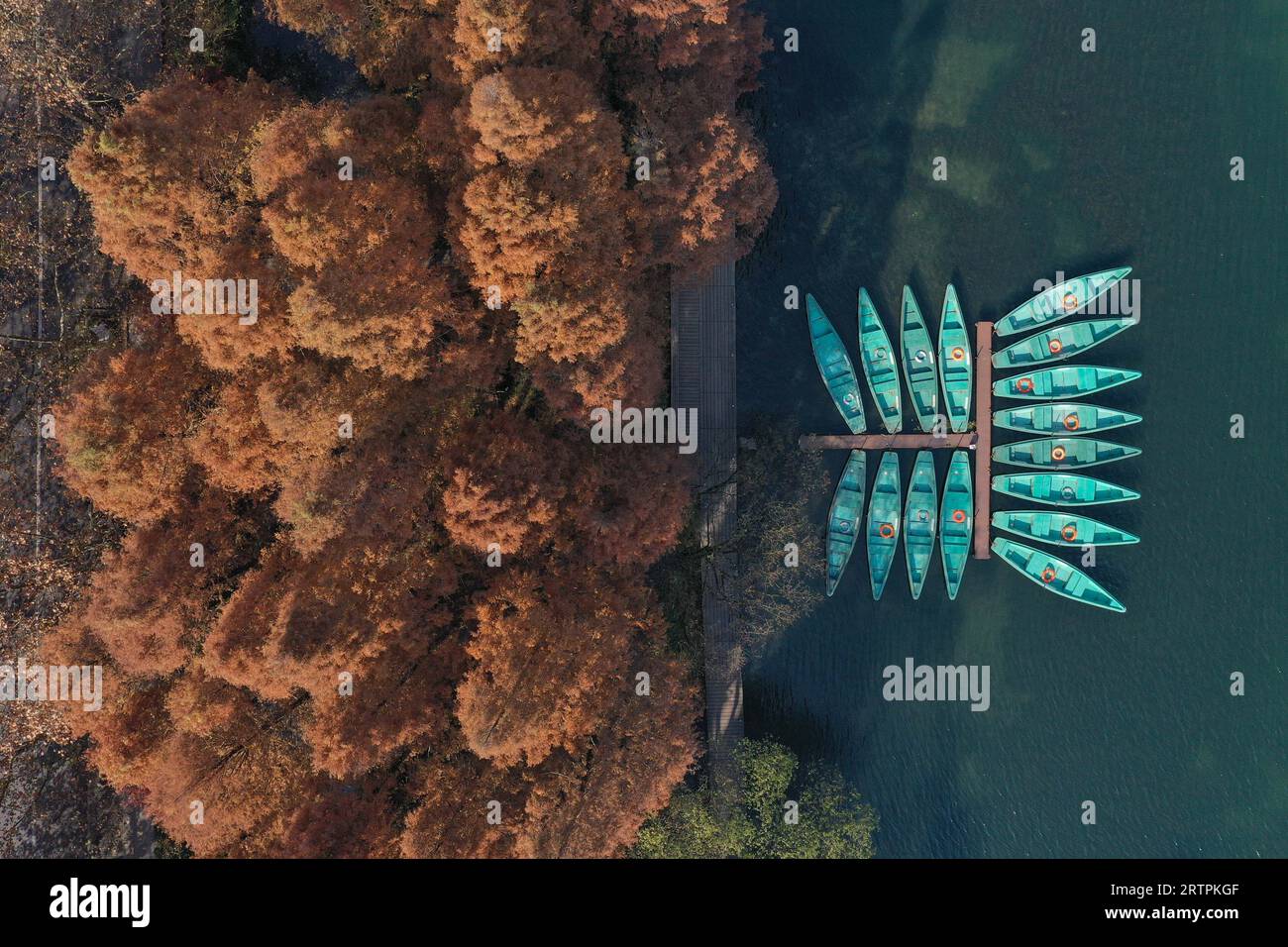 Hangzhou. 13th Dec, 2019. This aerial photo taken on Dec. 13, 2019 shows a view of the West Lake scenic area in Hangzhou, east China's Zhejiang Province. The 19th Asian Games will take place in Hangzhou between September 23 and October 8, featuring a total of 40 sports. It will be the third Asian Games to be hosted in China, after Beijing 1990 and Guangzhou 2010. The highly anticipated Asian Games can help boost the popularity of Hangzhou where history and modernity co-exist and further promote its culture. Credit: Huang Zongzhi/Xinhua/Alamy Live News Stock Photo