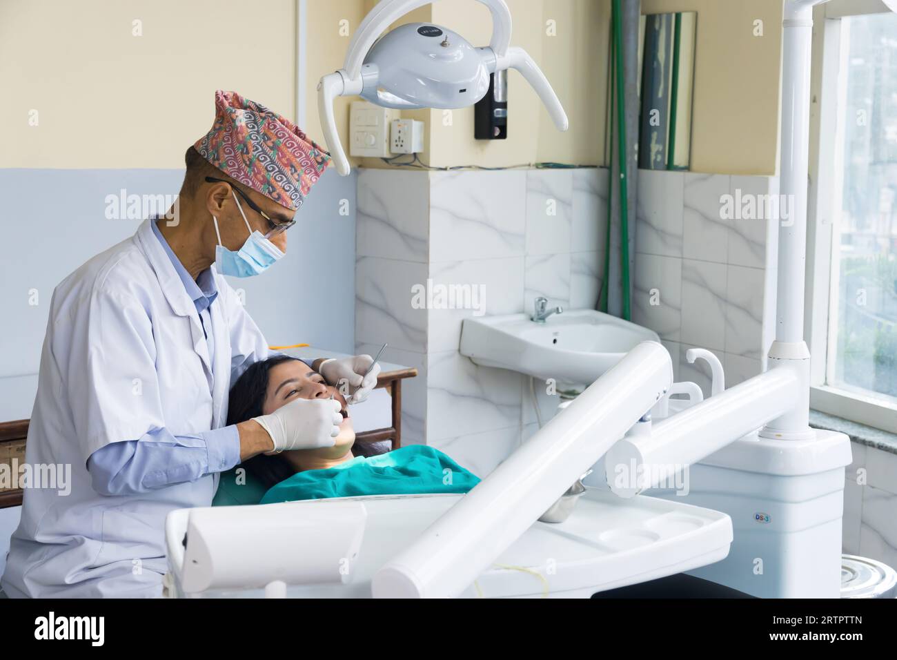 Kathmandu, Nepal September 02, 2023 A Nepali dentist treating his