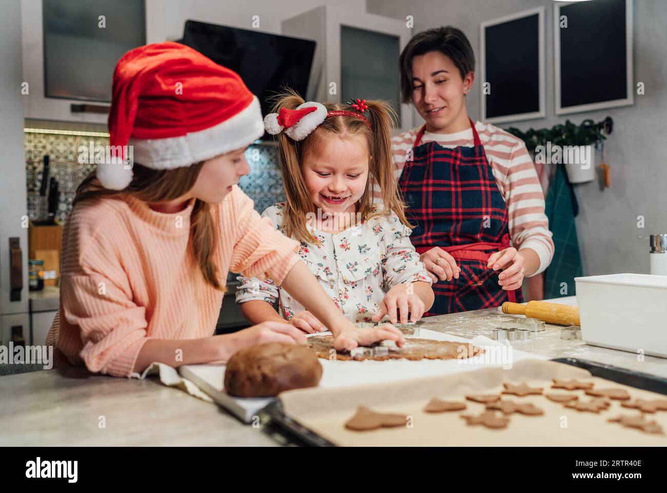 Boy and Girl in Red Hats Holding Gift and Bengals Stock Image - Image of  holiday, cheerful: 110216867