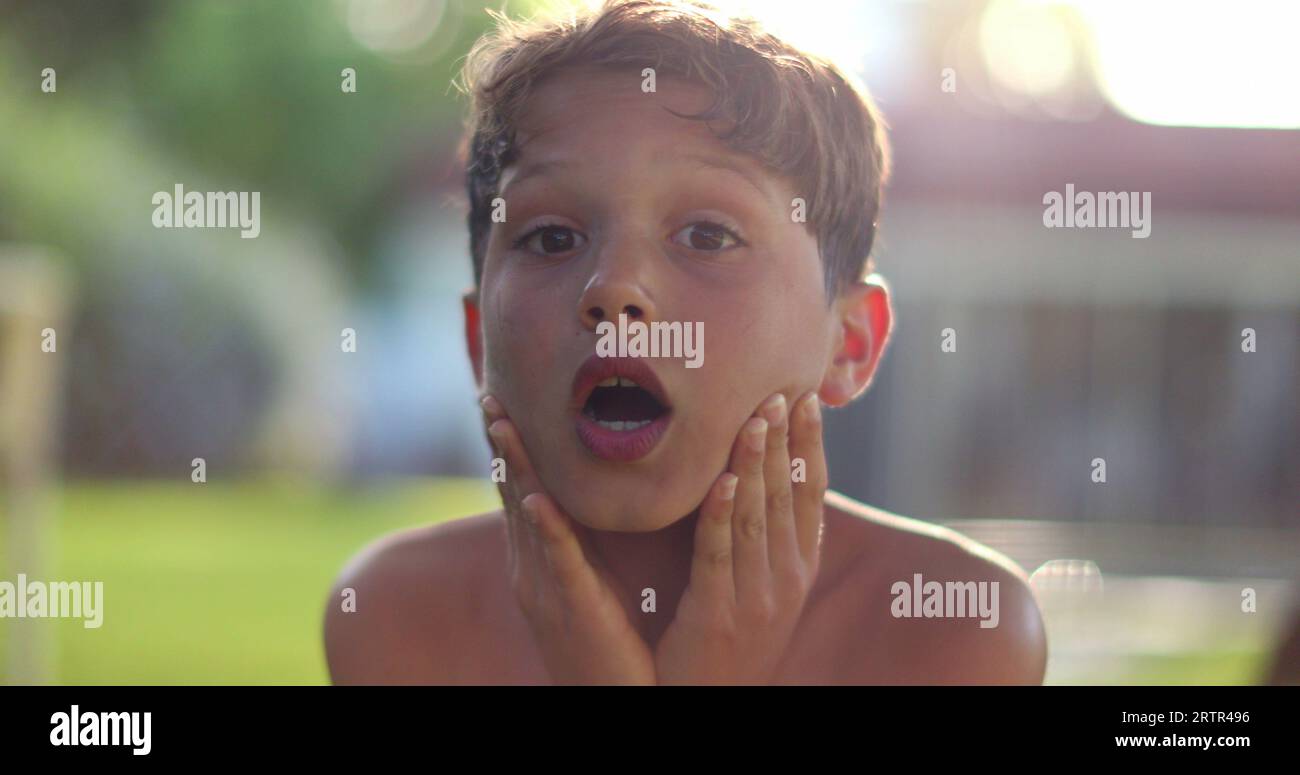 Child boy SHOCK reaction with despair. Emotional kid reacting with