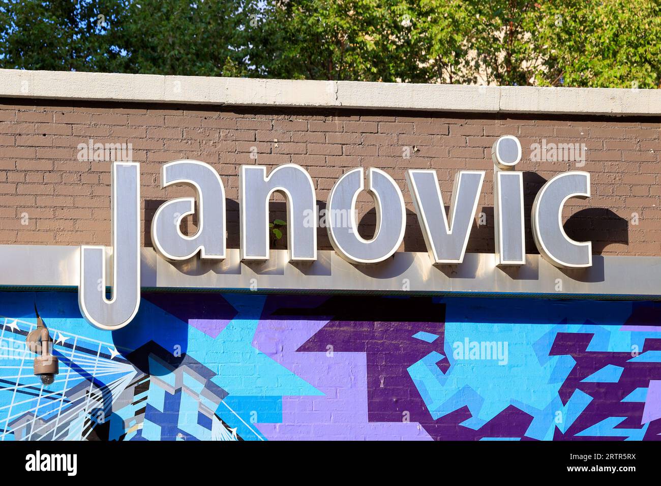 Signage for Janovic Paint & Decorating in New York City. Stock Photo