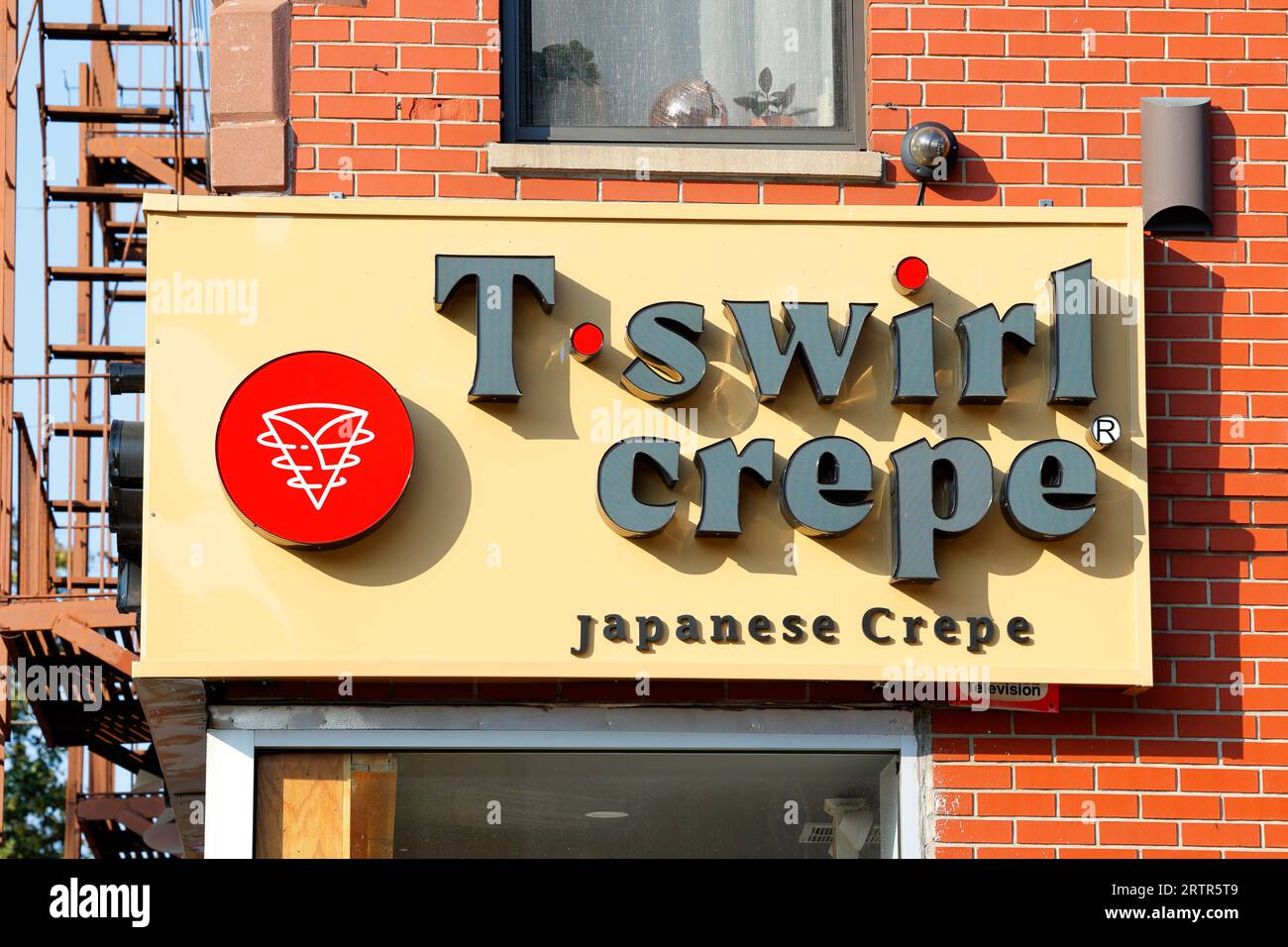 Signage for T Swirl Crepe at a franchise location in Brooklyn, New York City. Stock Photo