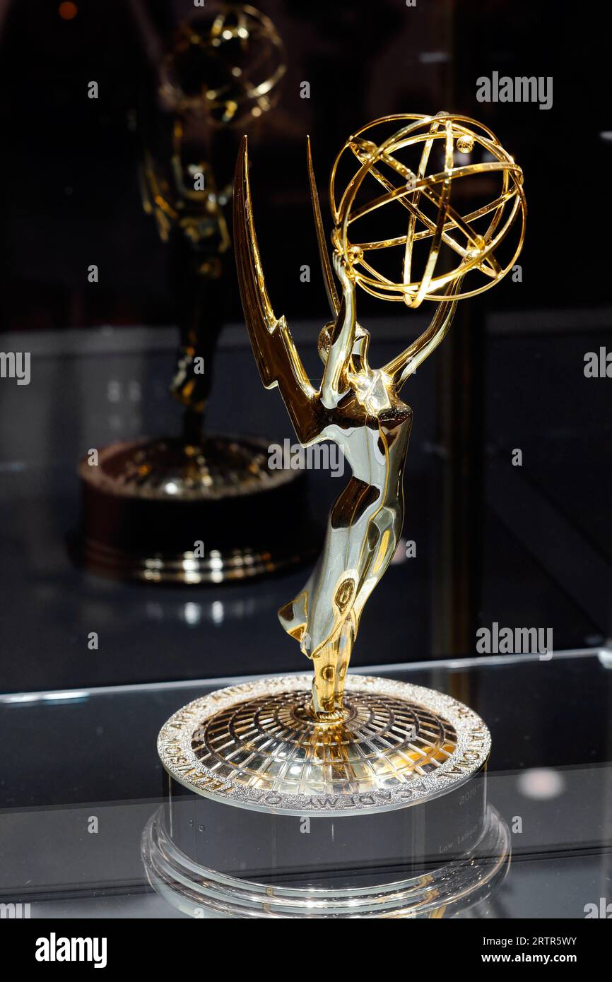 An Emmy award statuette in a display case. National Academy of Television Arts and Sciences trophy Stock Photo
