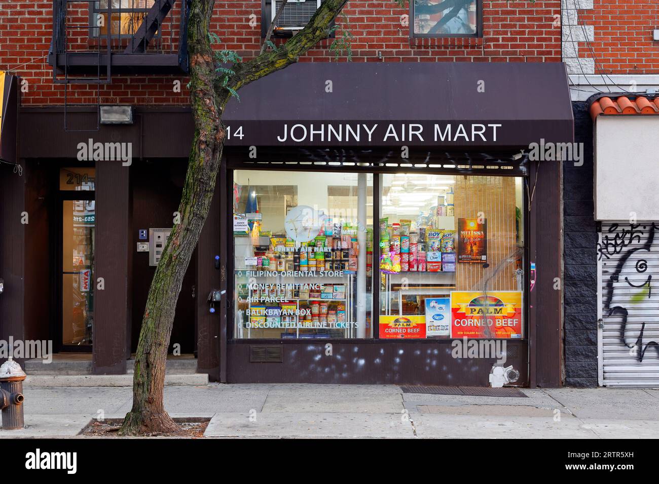 Johnny Air Mart, 214 Avenue A, New York. NYC storefront photo of a Filipino grocery store in Manhattan's East Village neighborhood. Stock Photo