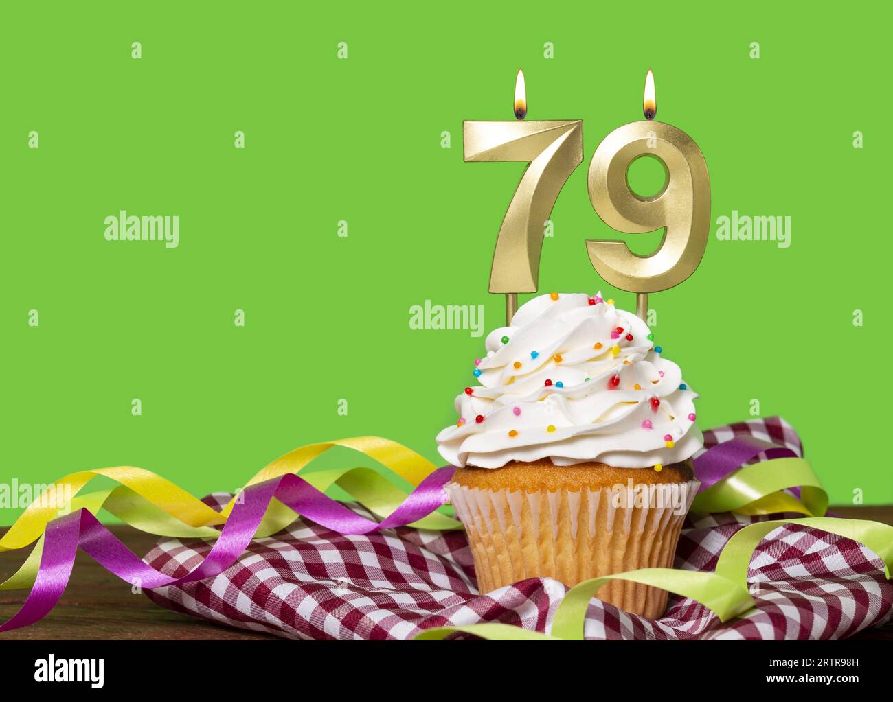 Birthday Cake With Candle Number 79 On Green Background Stock Photo