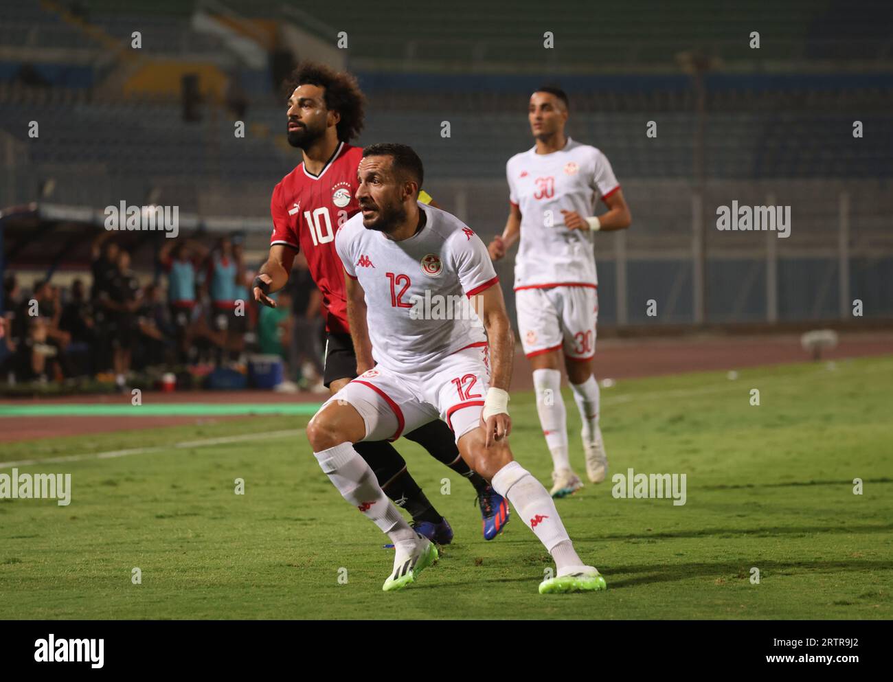 Egypt, Cairo - 12 September 2023 - Mohamed Salah of Egypt and Ali Maaloul of Tunisia during friendly international match between Egypt and Tunisia at Stock Photo