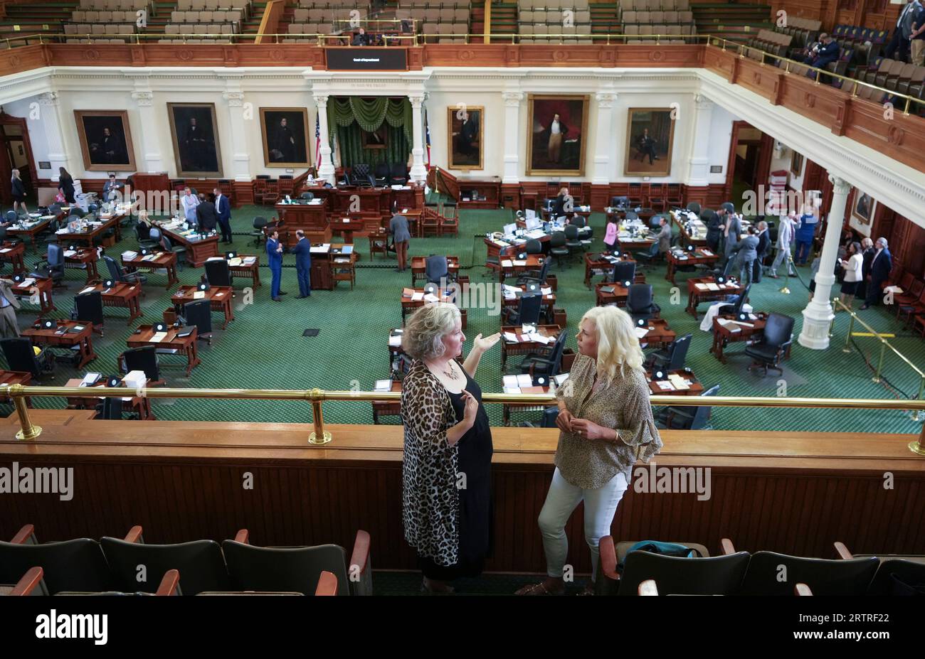 Spectator KRISTINA HENDRIX, r, and a friend discuss the Paxton trial during an afternoon break on day eight in Texas Attorney General Ken Paxton's impeachment trial in the Texas Senate on September 14, 2023. Credit: Bob Daemmrich/Alamy Live News Stock Photo