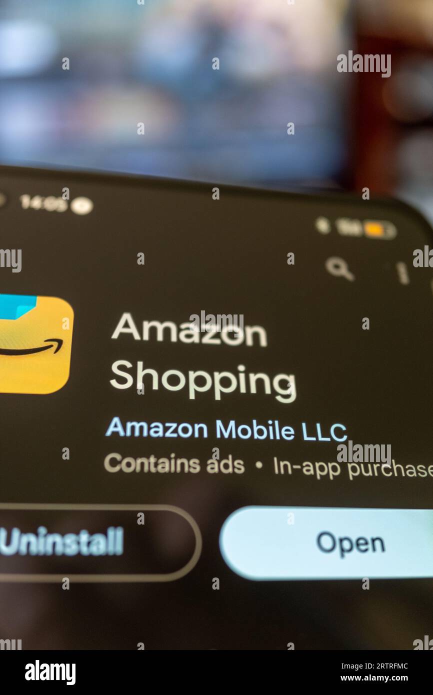 Madrid, Spain 09 12 2023 Hand holding a smartphone with the Amazon application Stock Photo Alamy