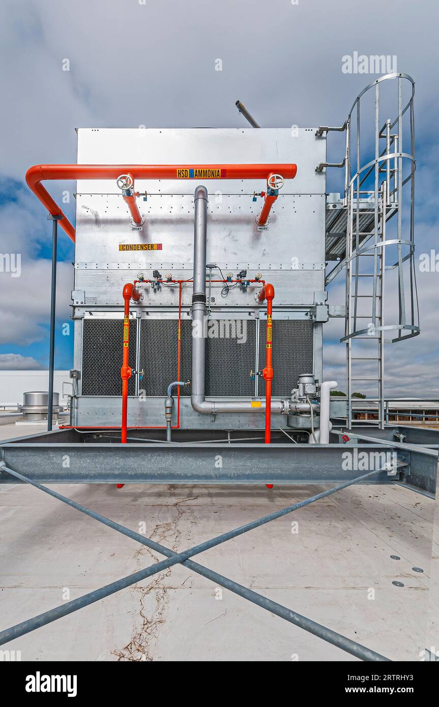 Orange piping is prominent on the side of a commercial ammoniacycle