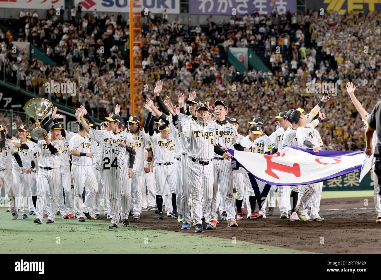 Members of Hanshin Tigers celebrate after grabbing championship of central league at Hanshin Koshien Stadium in Nishinomiya City, Hyogo Prefecture on September 14, 2023