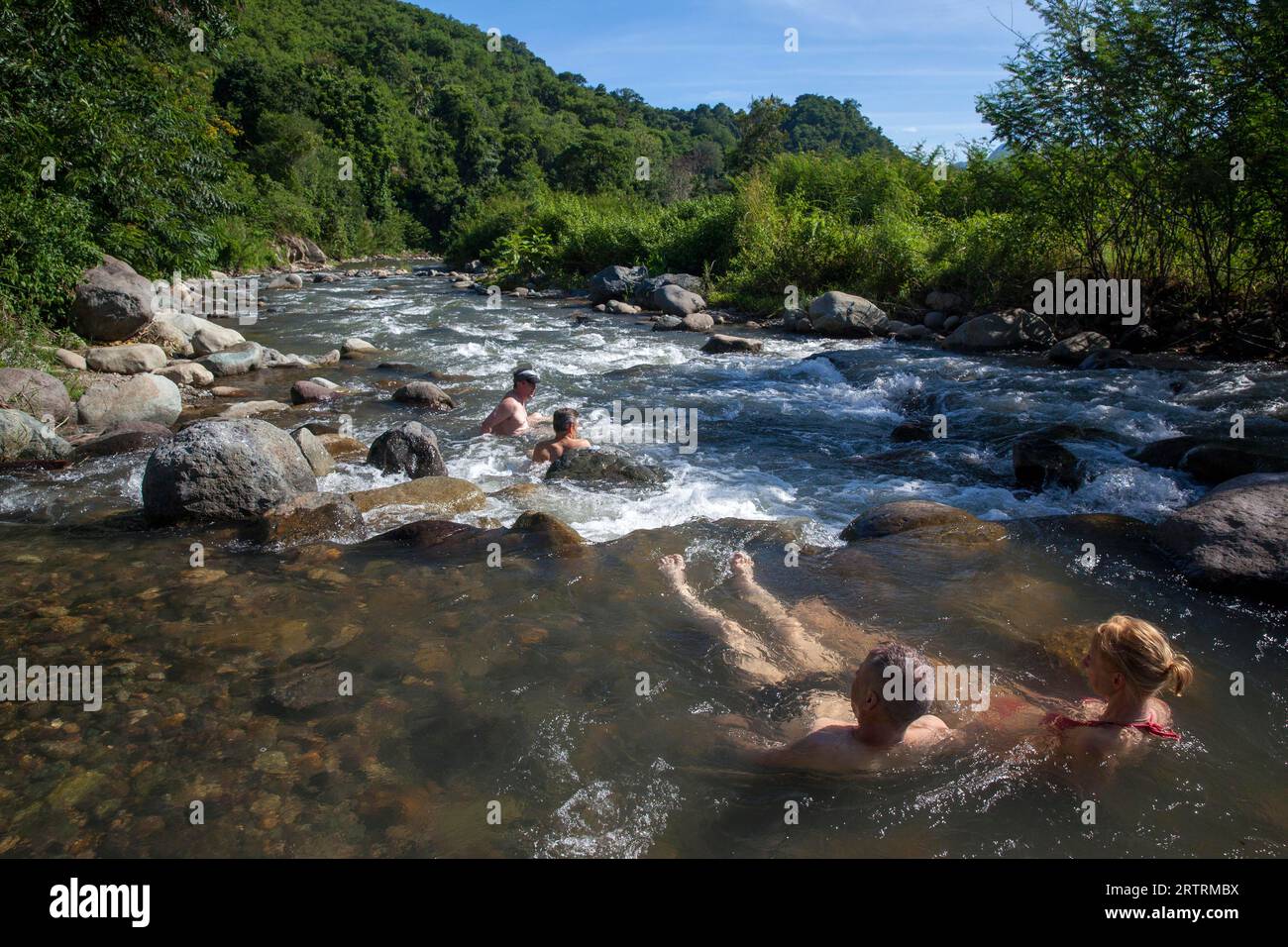 Bathing in white water, Lekebai River, Flores, Indonesia Stock Photo