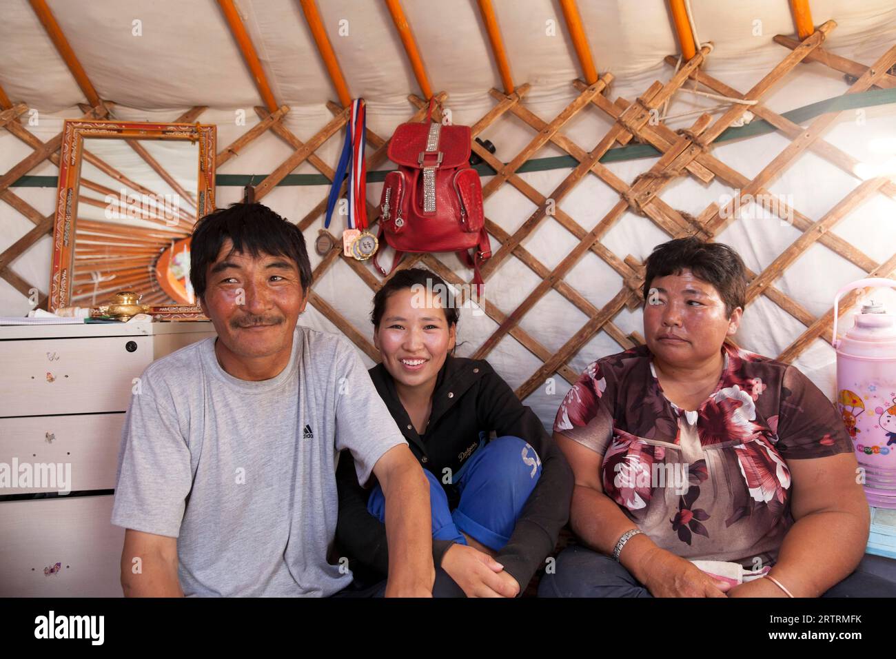 Camel herder family in their yurt, Mongolia Stock Photo