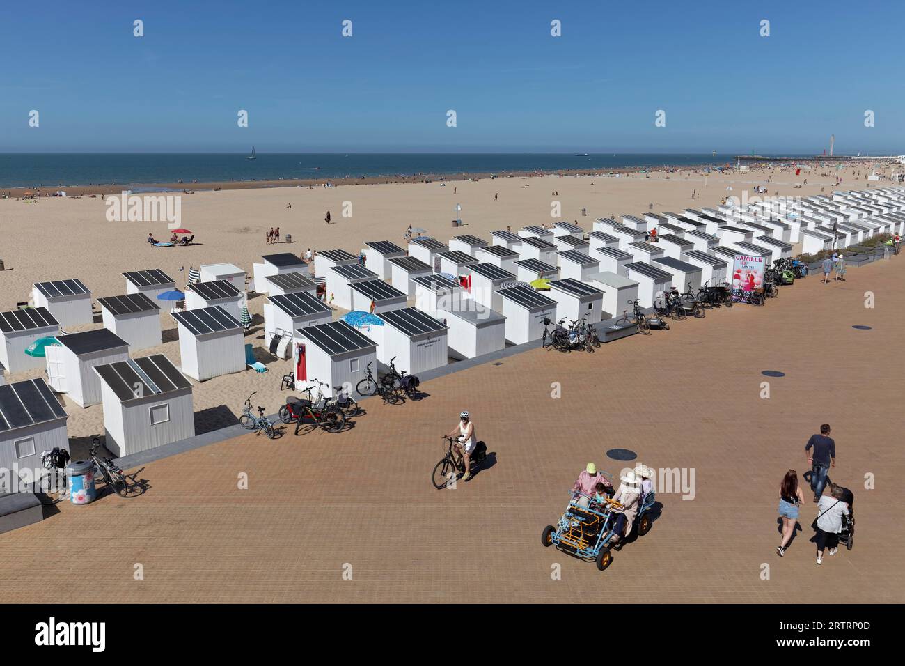 Beach with white beach huts and promenade in summer, Ostend, Belgian coast, West Flanders, Belgium Stock Photo