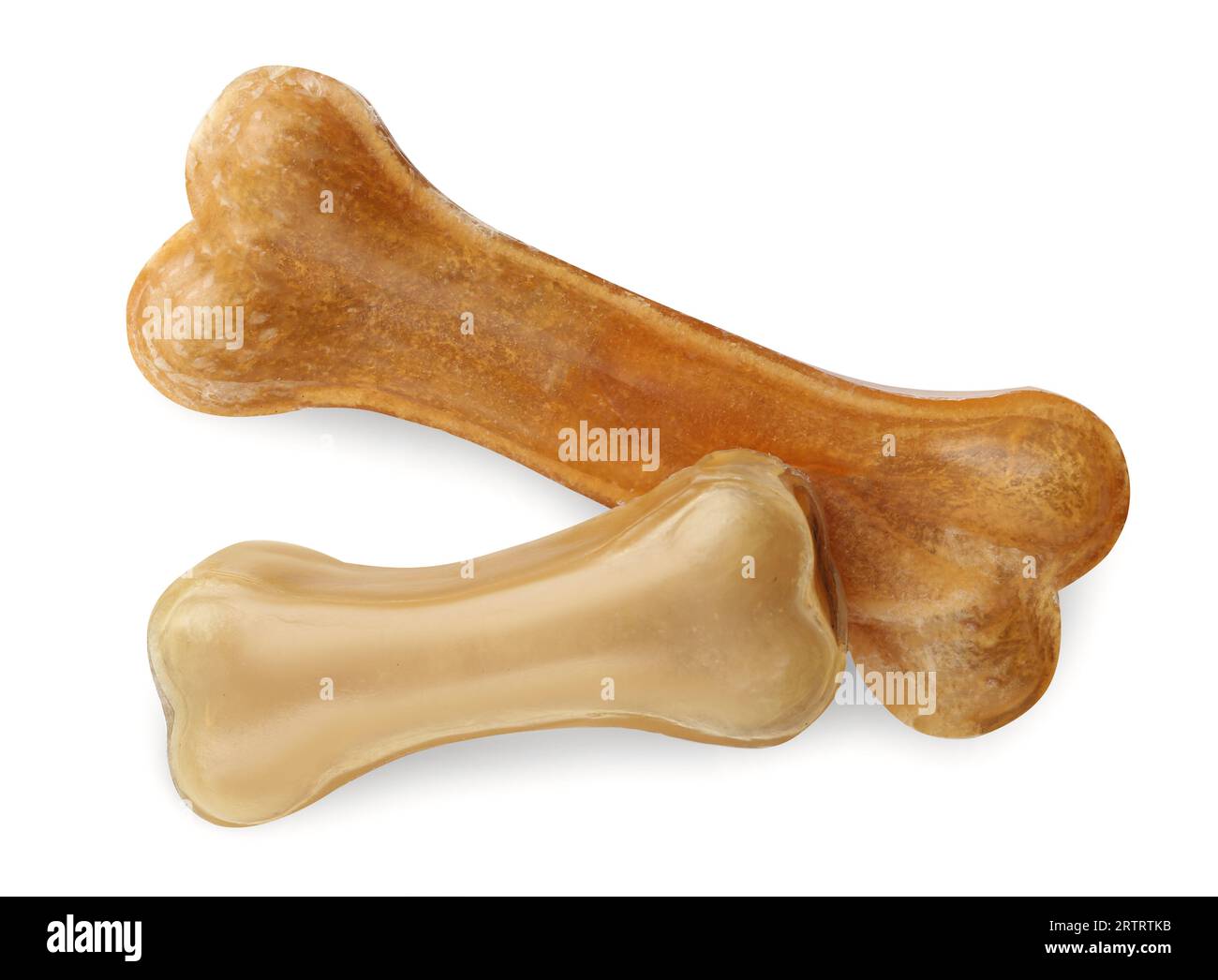 Chew bones for dog isolated on white, top view. Pet toys Stock Photo
