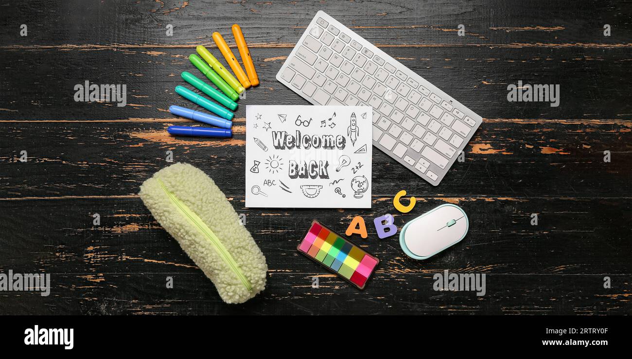 Welcome Written On Computer Paper sheet with text WELCOME BACK, different stationery, computer ...