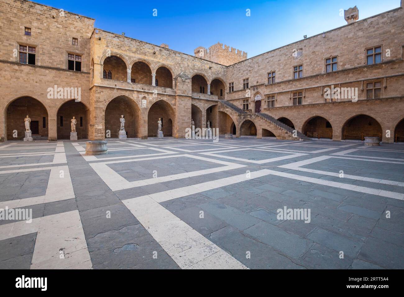 Inner courtyard surrounded by arcades with statues from Hellenistic and Roman times, Grand Master's Palace built in the 14th century by the Johnnite Stock Photo