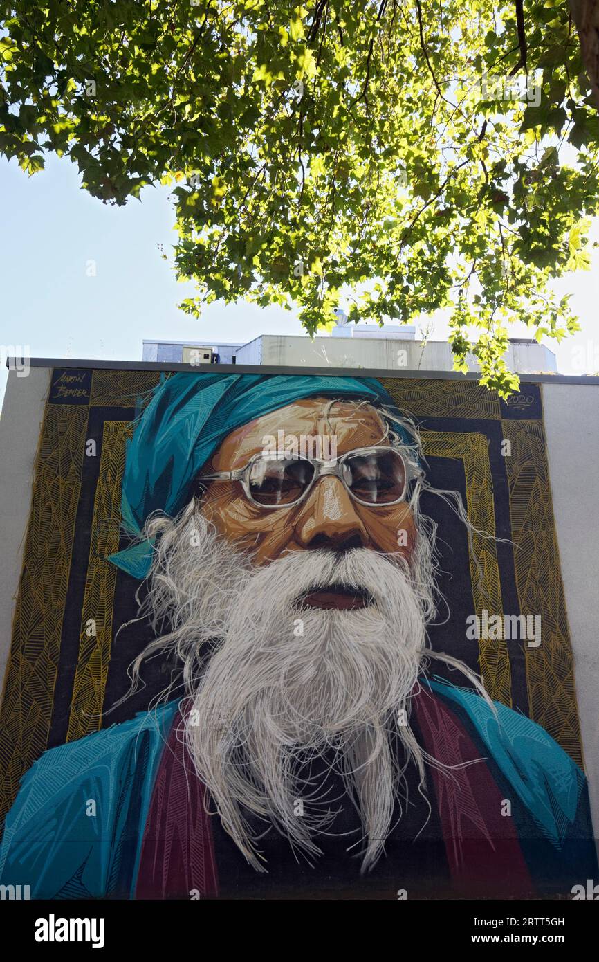 Mural, portrait of an old man with a striking face, guru with white beard and headscarf, mural by Stretart artist Martin Bender, Bochum, North Stock Photo