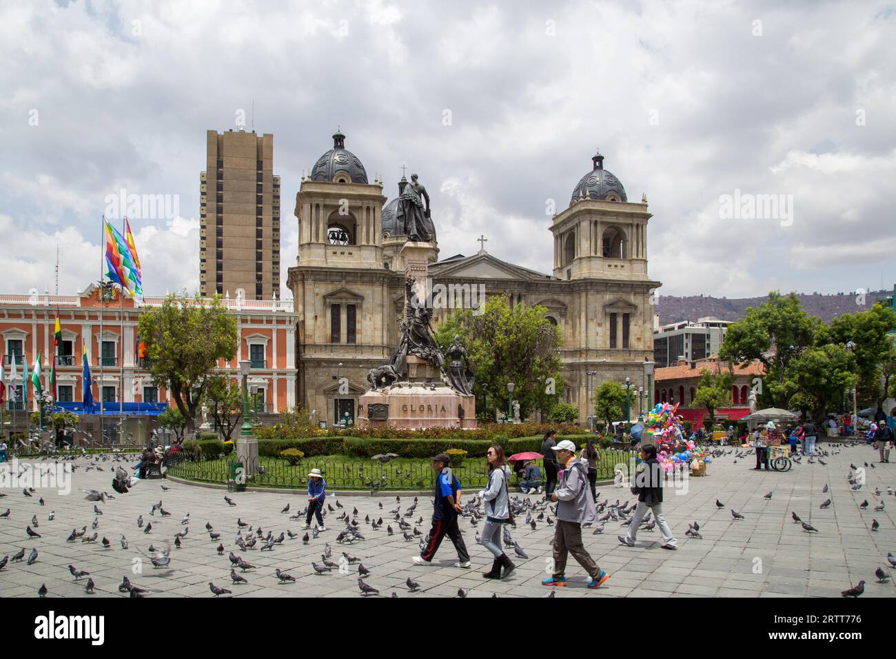 La Paz, Bolivia, October 24, 2015: People on Plaza Murillo with the cathedral in the background Stock Photo